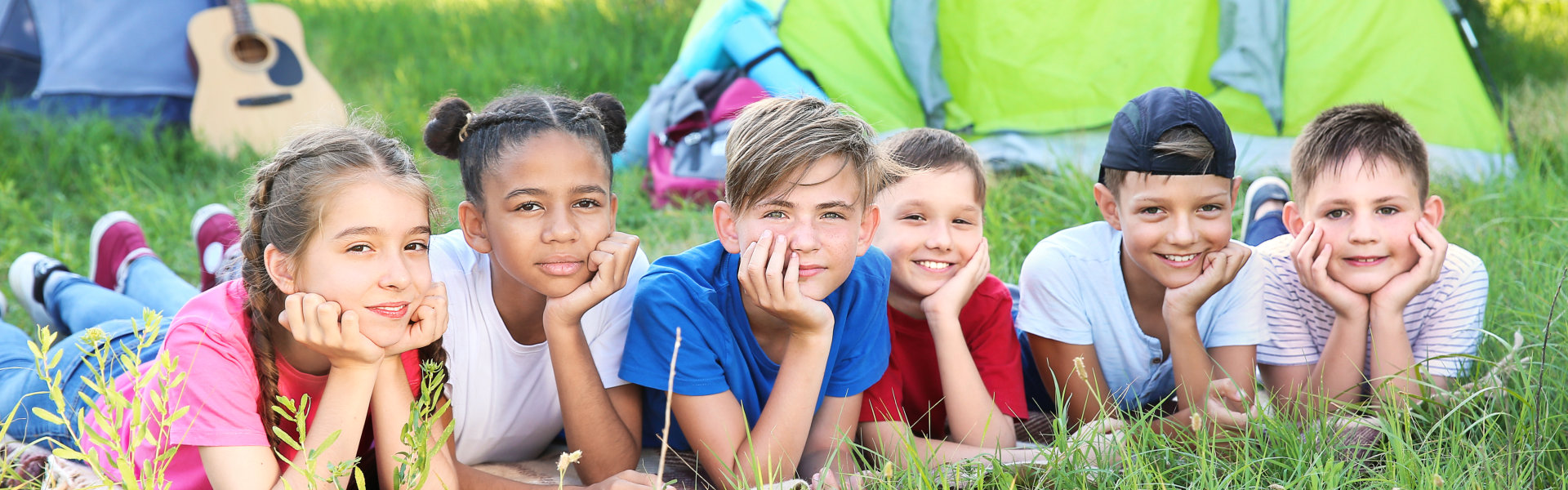 children laying on the ground
